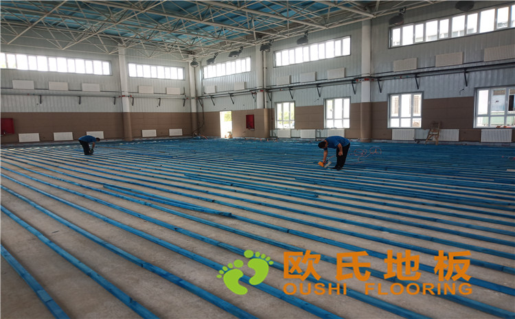 新疆克拉瑪依市獨(dú)山子虹園小區(qū)體育館木地板項(xiàng)目-歐氏運(yùn)動(dòng)木地板